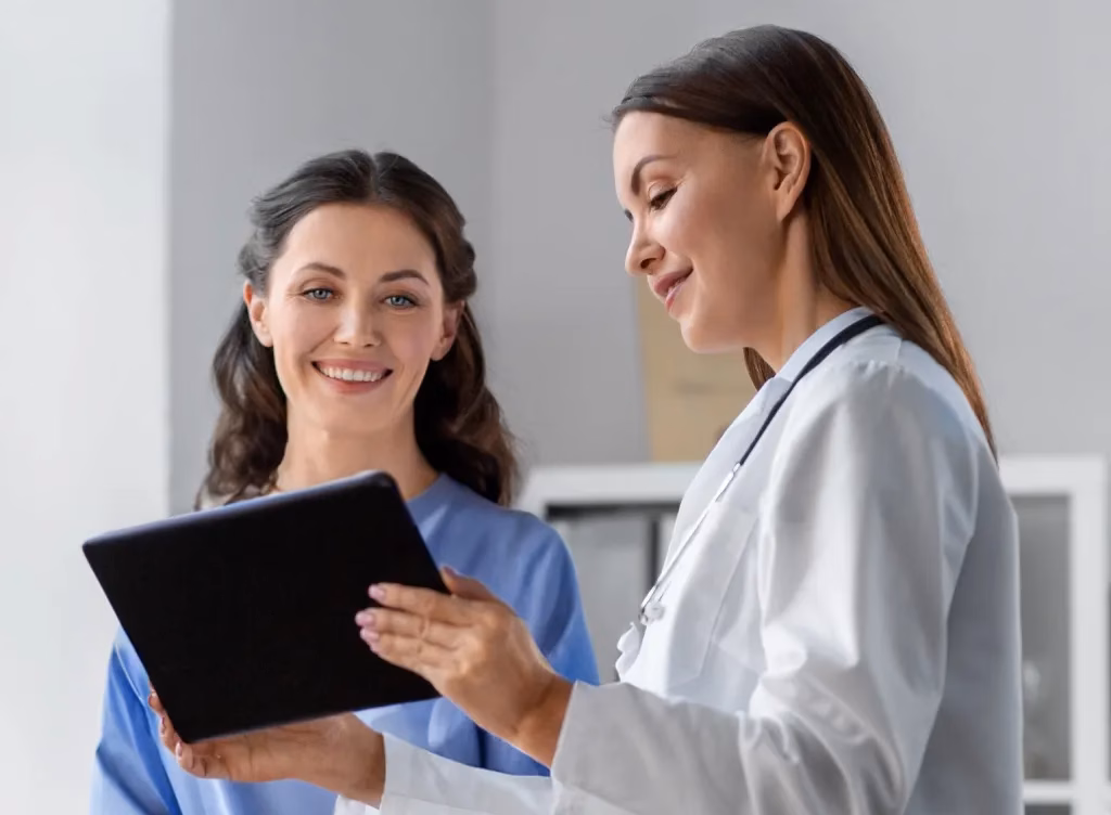 Home 1 MHG Website homepage Pic Doc and Patient scaled 1 Miskawaan Health Group